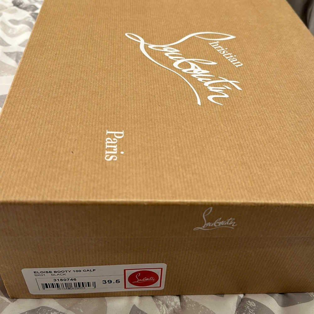 Christian Louboutin Eloise booties- never been worn, in original packaging.